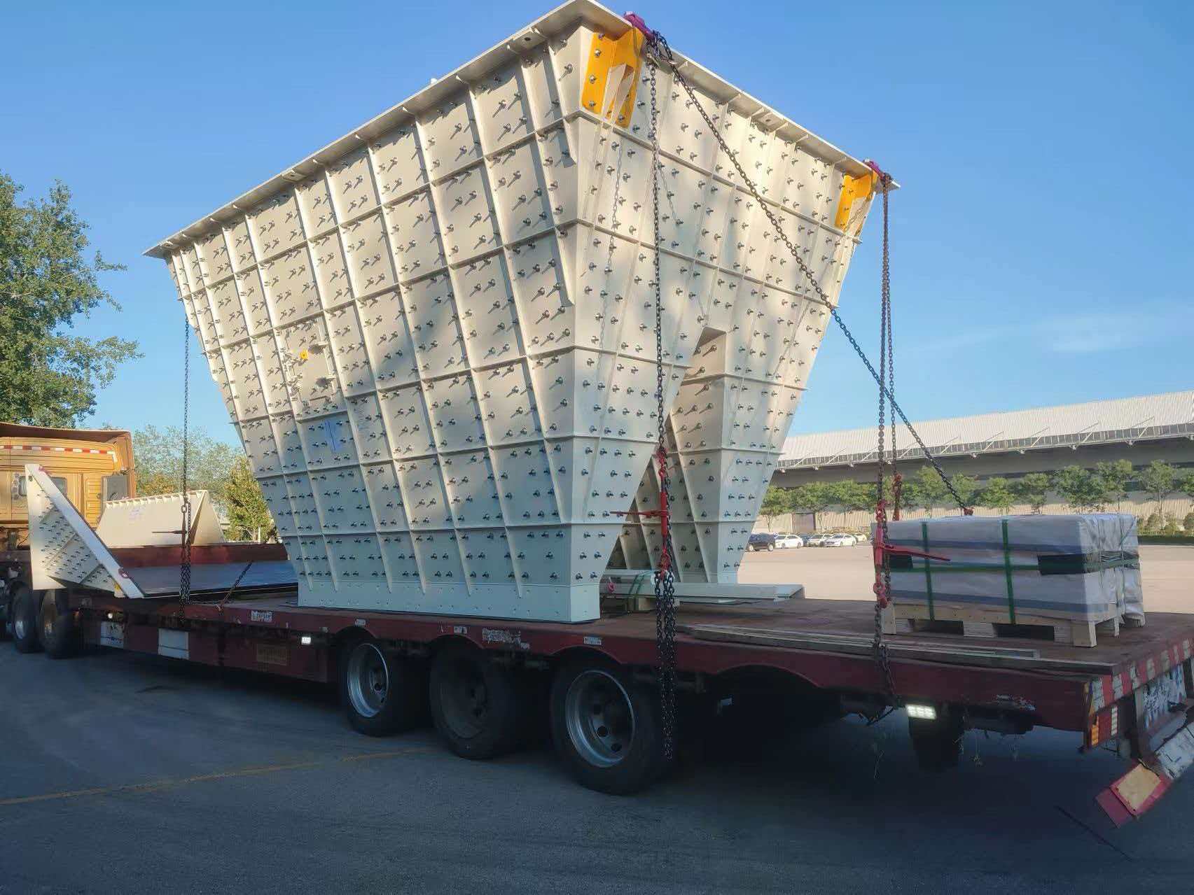 White mining feed hopper loaded for shipment